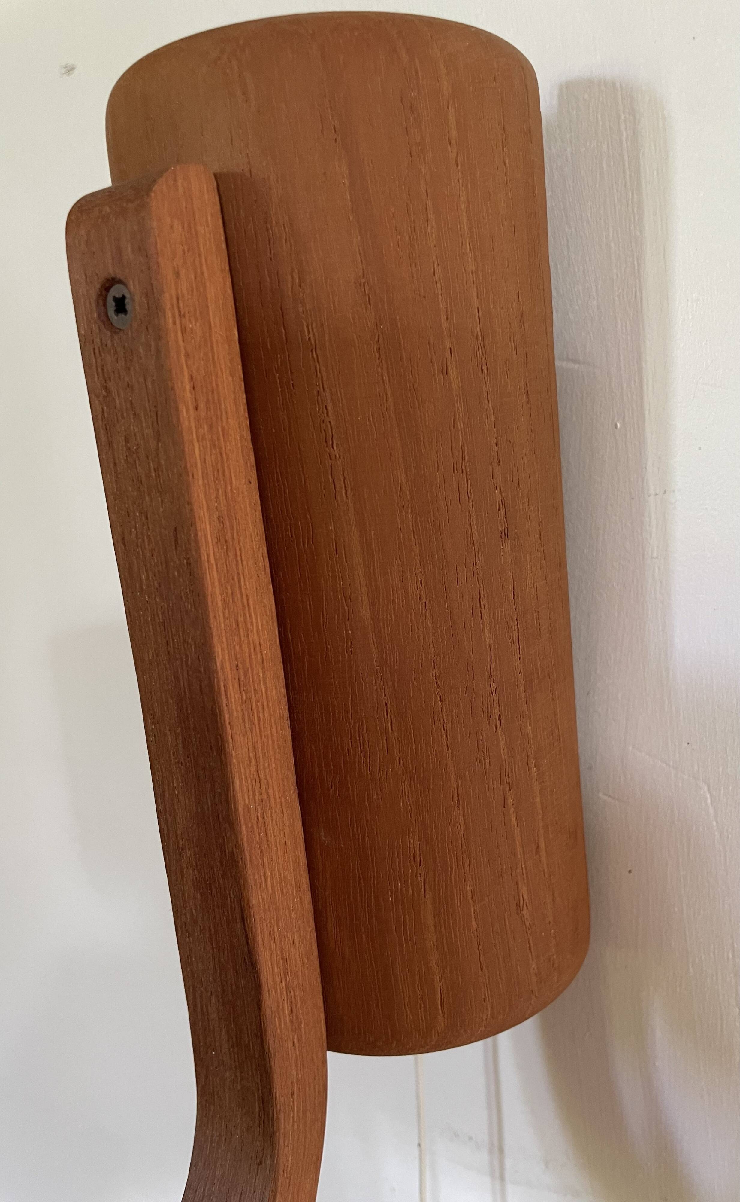 Pair of Scandinavian teak wall lights, Dolmus, 70s