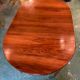 Louis XVI style oval walnut extendable table