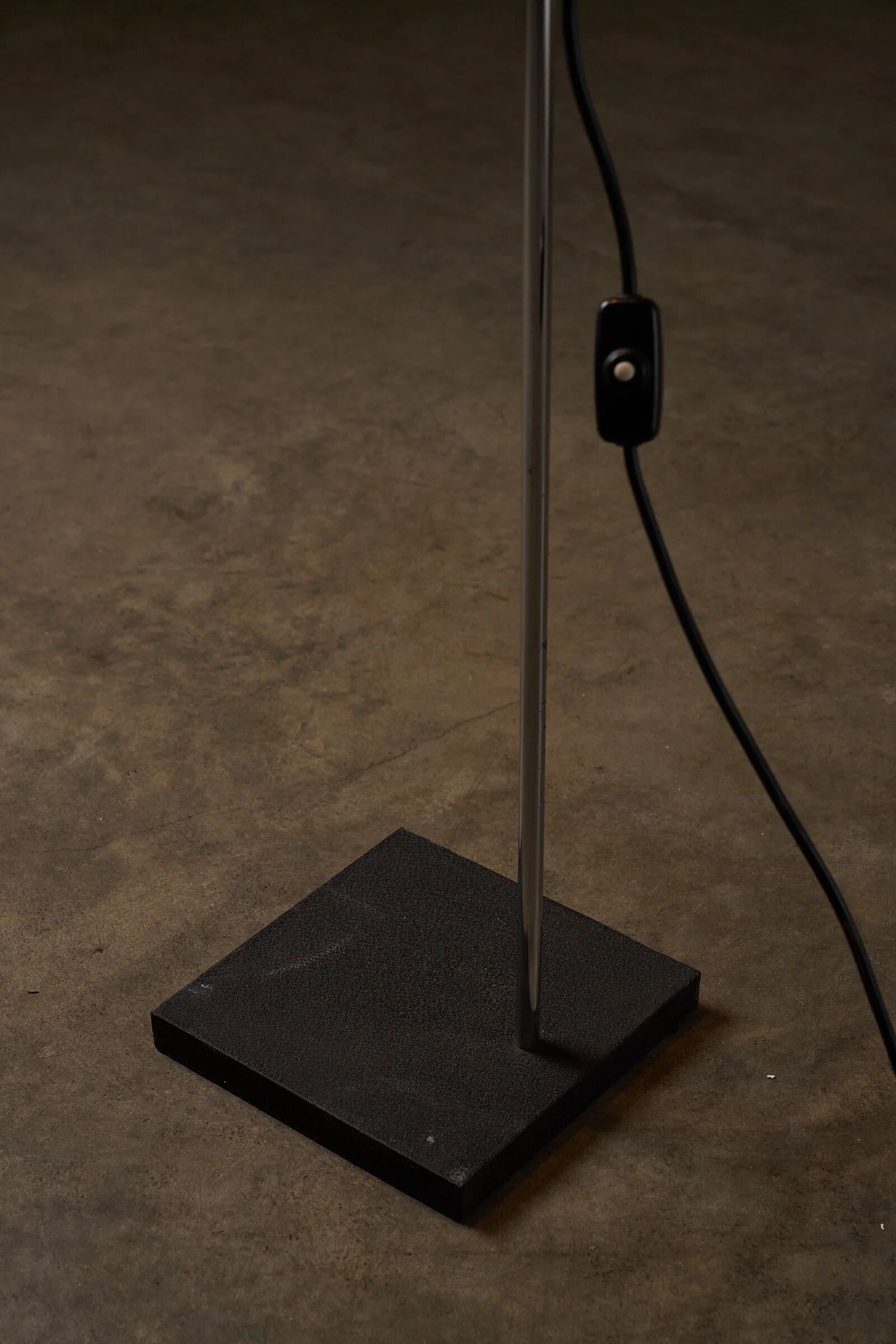 Adjustable perforated shade floor lamp