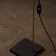 Adjustable perforated shade floor lamp