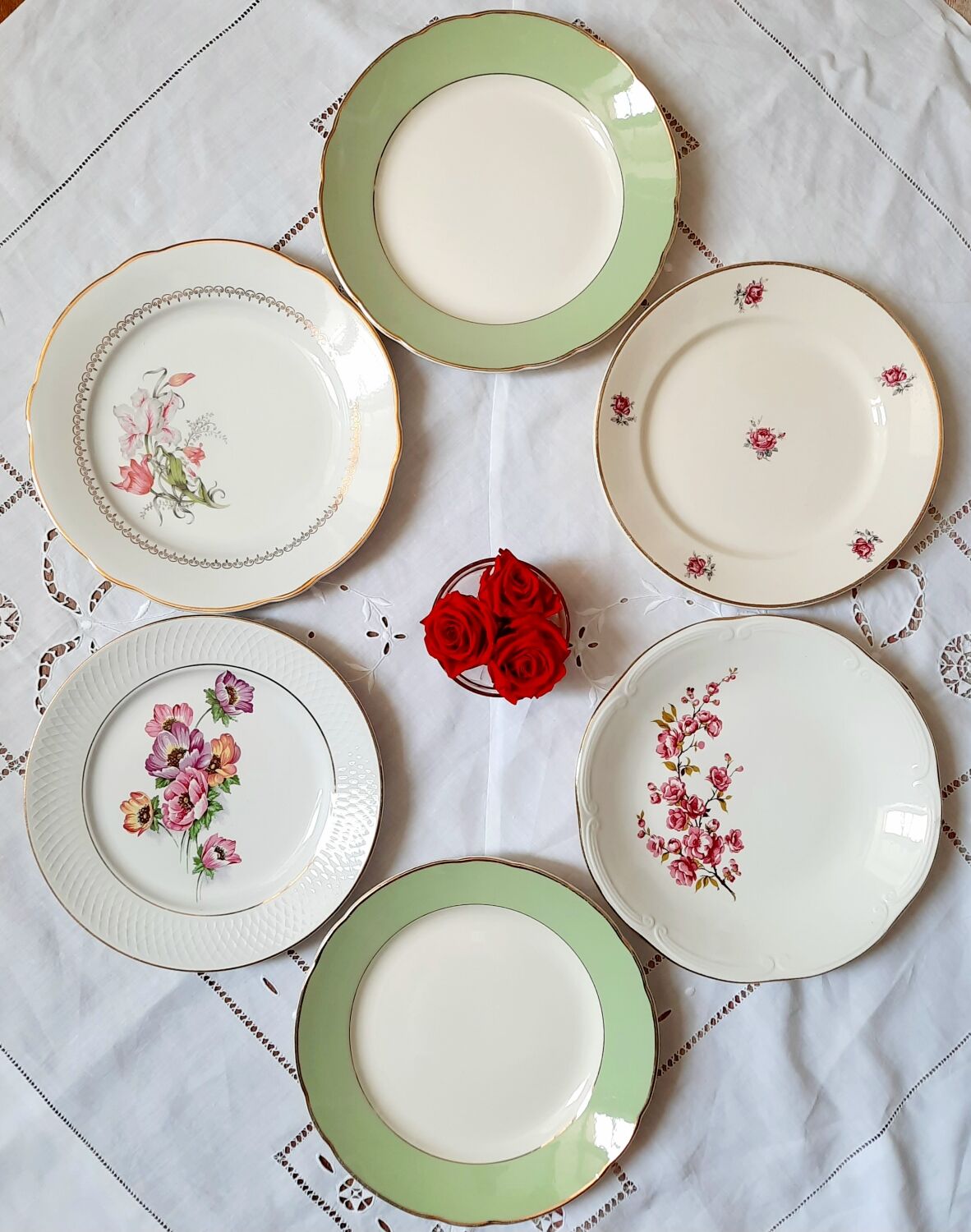 Flat antique earthenware plates with gilded edges