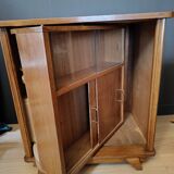Vintage retractable swivel bar cabinet from the 1950s