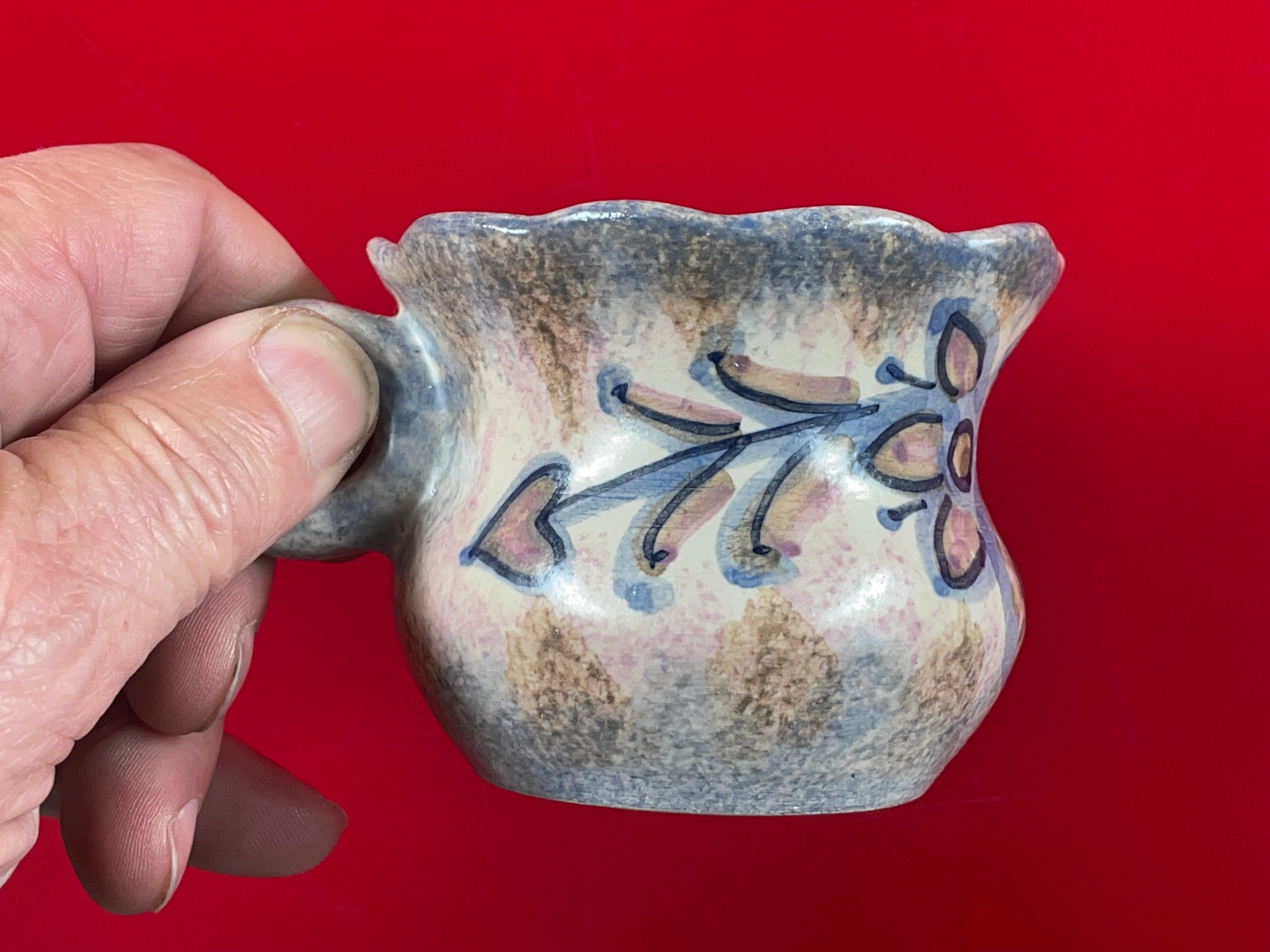 Set of 8 ceramic Quimper cups and under cups