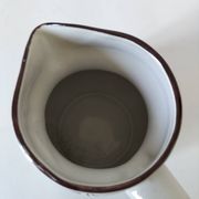Ceramic pitcher from Quimper, created by Dominique Villard.
