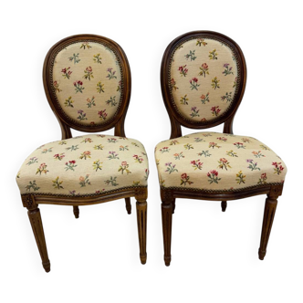 Pair of Louis XVI medallion chairs with canvas.