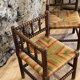 Pair of corner armchairs paillés in turned wood antique multicolored seat