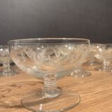 Suite of 12 champagne glasses in cut glass with floral decoration