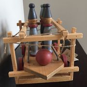 Set of Moulin Roty brand wooden bowling on roller cart, limited series.