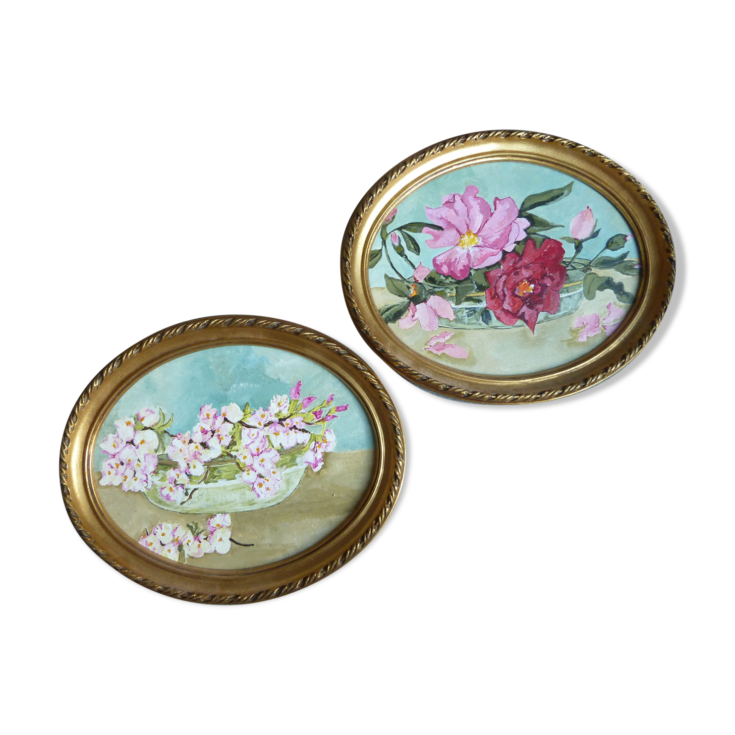 Pair of stucco frames and oil bouquets