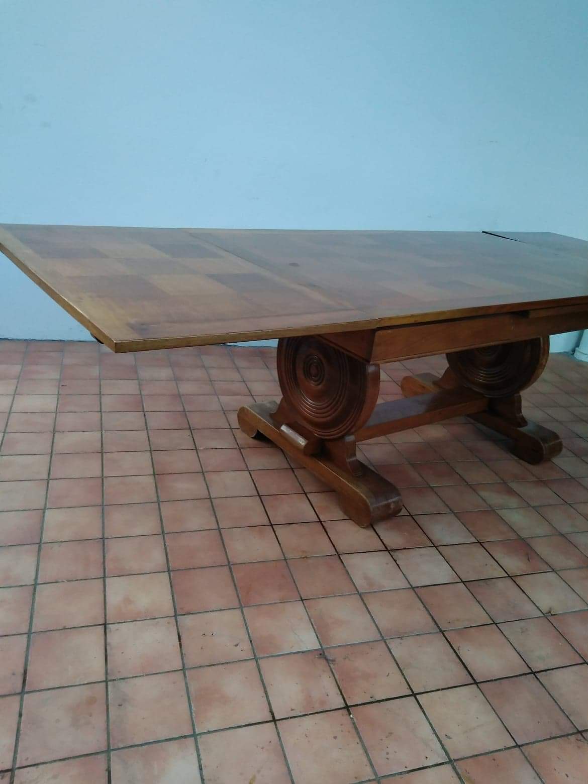 Table from the 1940s in solid oak in the style of Victor Courtray.