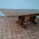 Table from the 1940s in solid oak in the style of Victor Courtray.