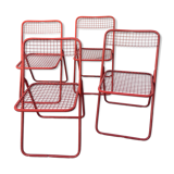 4 red 70s chairs