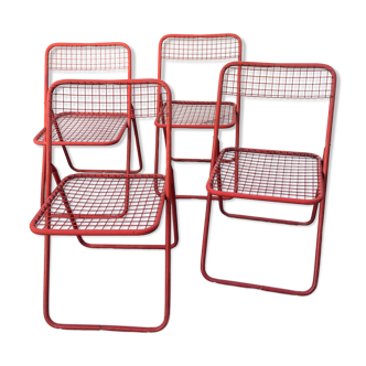 4 red 70s chairs
