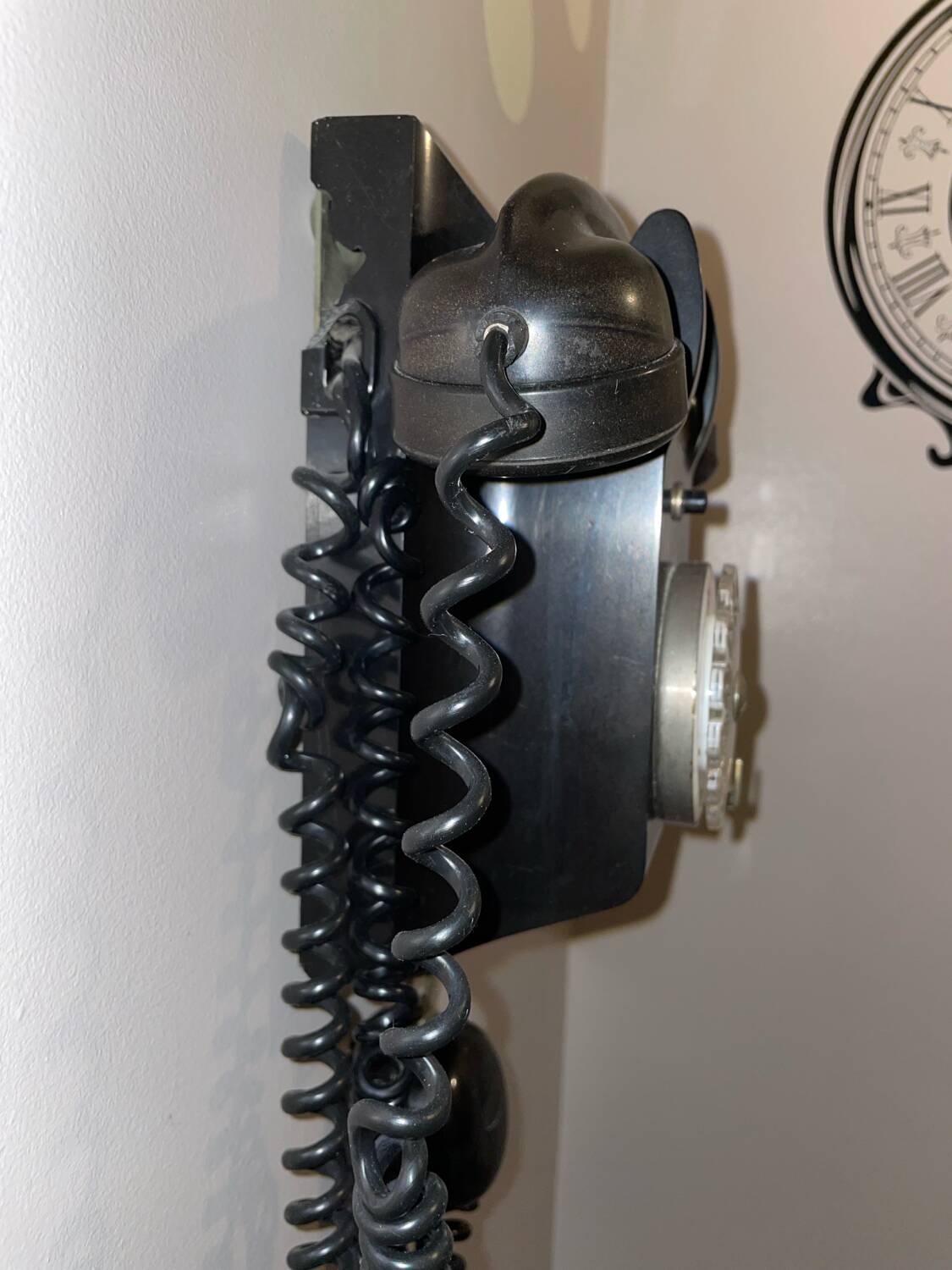 Old Ericsson wall telephone in black bakelite