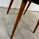 Vintage Baumann chair from the 1950s - curved wood and green seat.