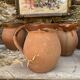 set of terracotta jugs country style