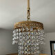 Brass chandelier and crystal tassel waterfall