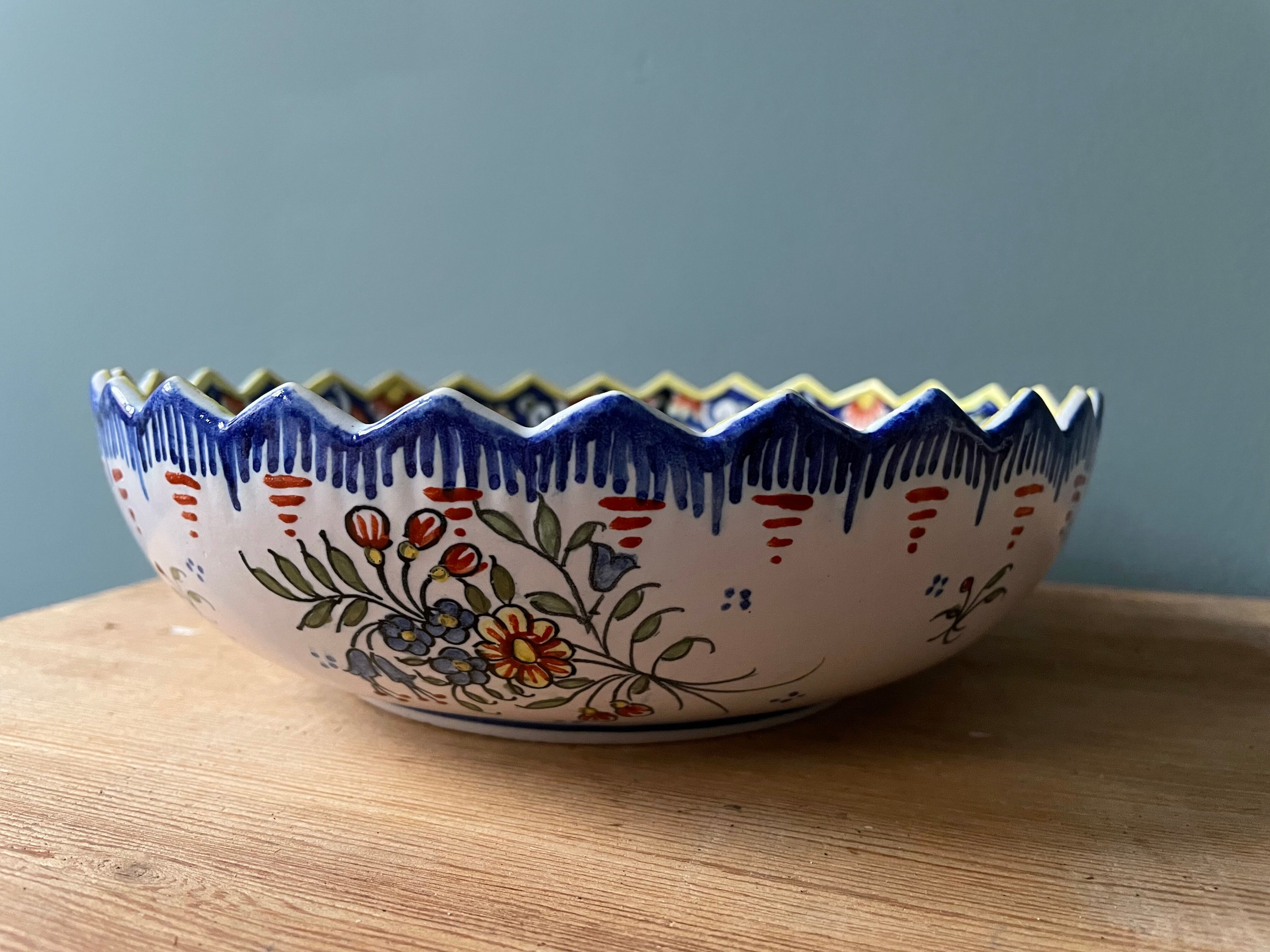 Hollow round dish in Rouen earthenware