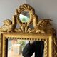 Mirror between two Louis XVI style in gilded wood with leaf around 1900