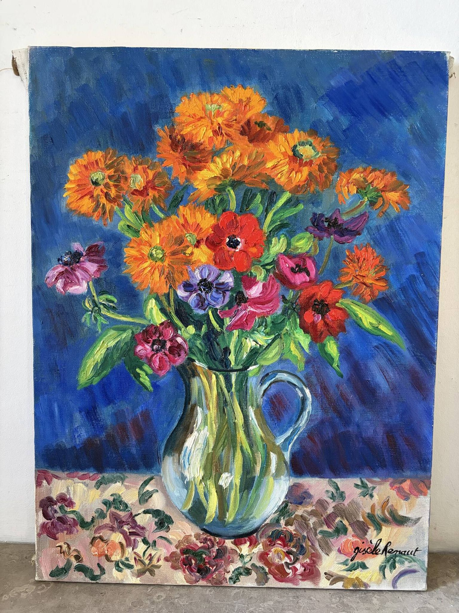 Anemones and marigolds, oil on canvas signed Gisèle Renaut.