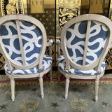 Pair of restored Louis XVI convertible armchairs