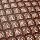 Napoleon III armchair reinterpreted – carved wood and shell pattern fabric