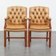 Set of 5 beautiful and luxurious cowhide Chesterfield dining/conference chairs in a light cognac colour