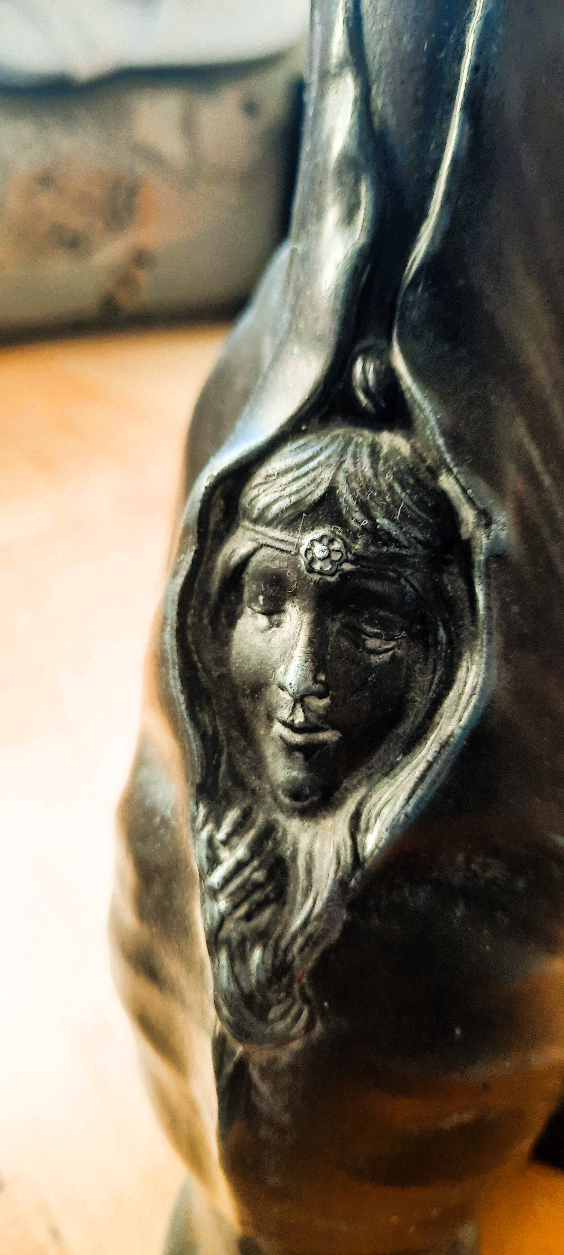 Single flower vase, Art Nouveau style, arum/calla motif and female faces.