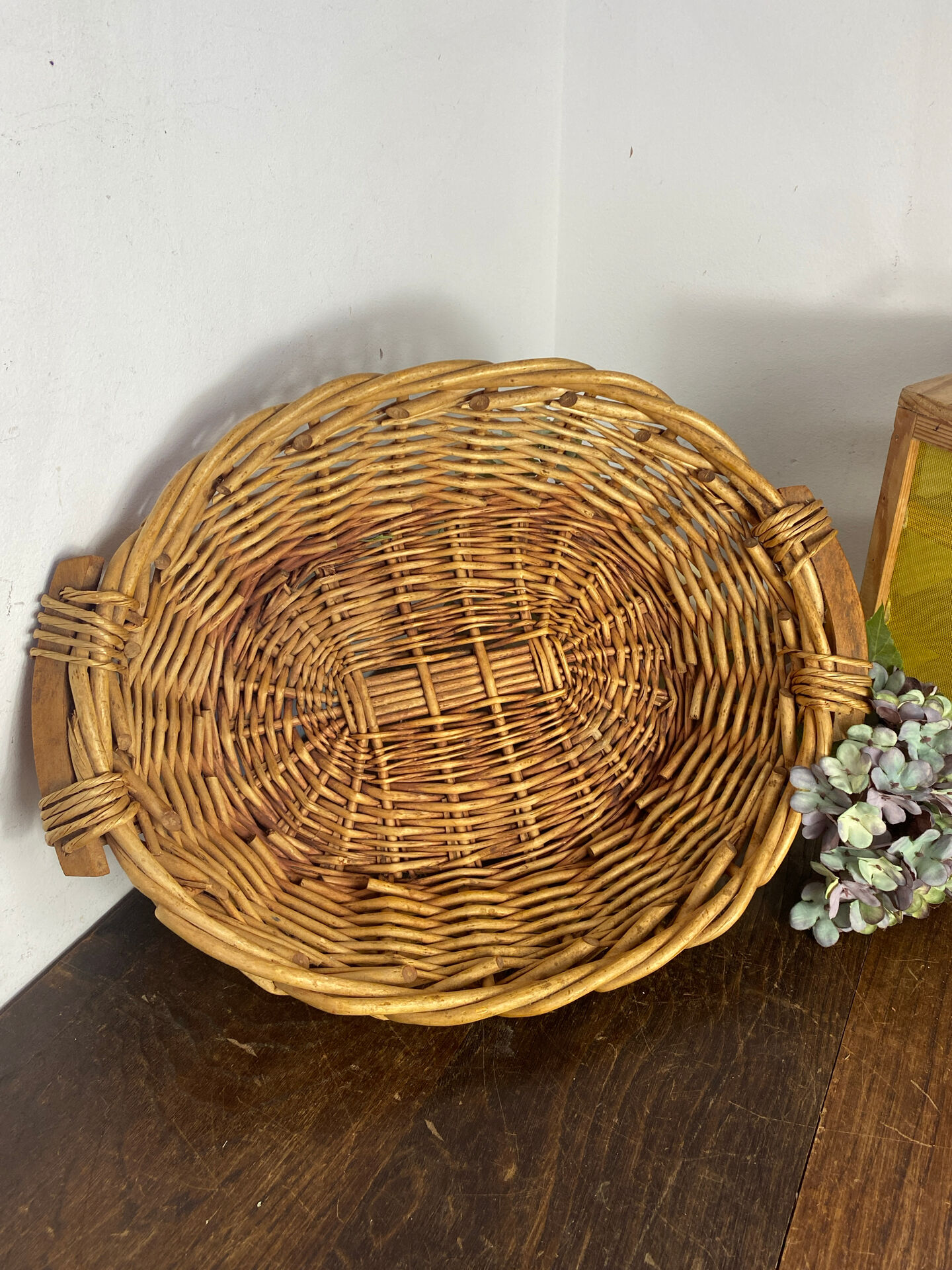 Wicker basket with wooden handles