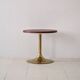 Table basse ronde vintage en cuir et métal