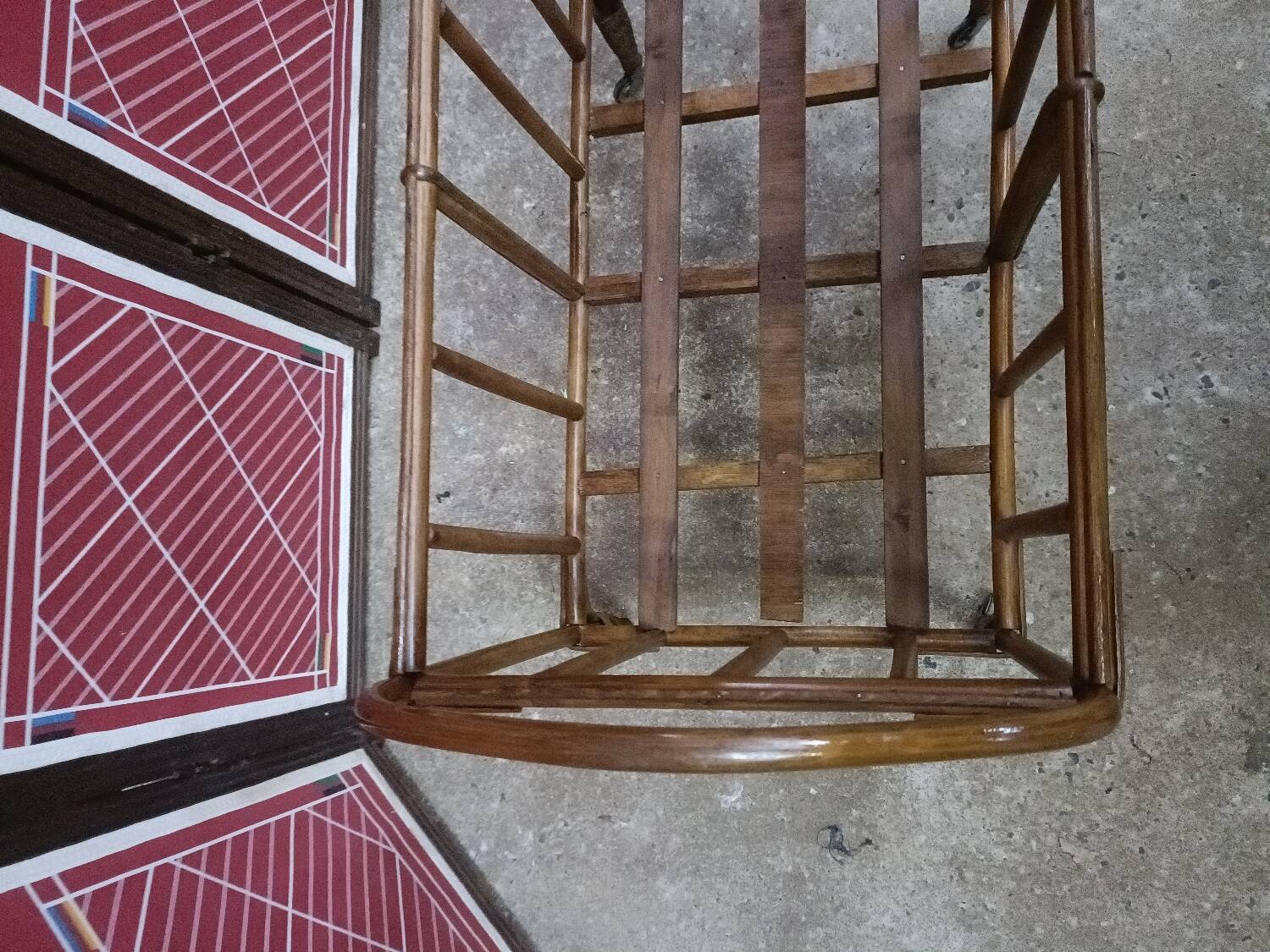 Old small bed or cradle for baby in vintage rattan