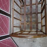 Old small bed or cradle for baby in vintage rattan