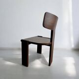 Retro brutalist chair in dark solid wood