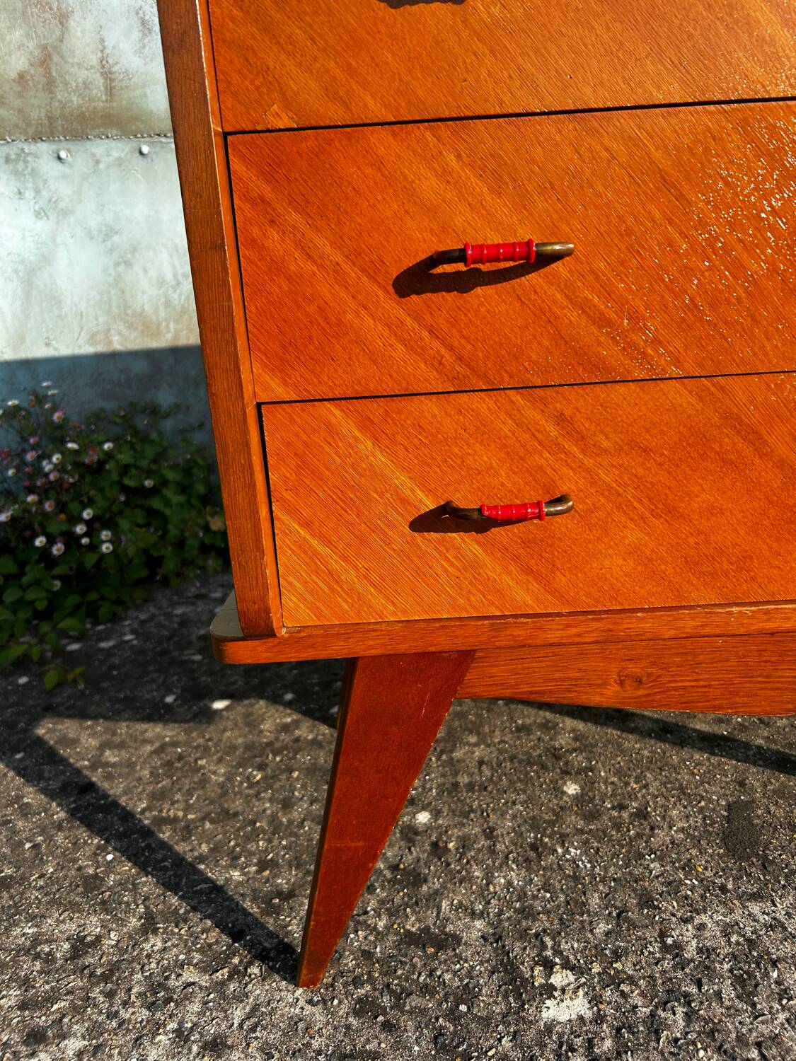Vintage chest of drawers with compass feet.