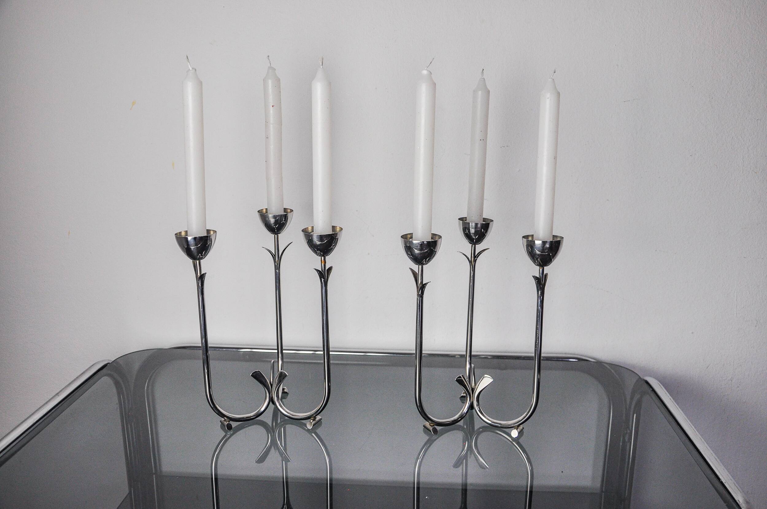 Pair of art deco stainless steel 3-flame candlesticks, Spain, 1970