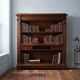 Antique walnut library with Corinthian decorations, 20th century.