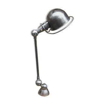 Magnificent duo of Jielde single-arm wall lights.