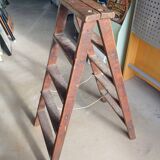 Old wooden stepladder shelf decoration