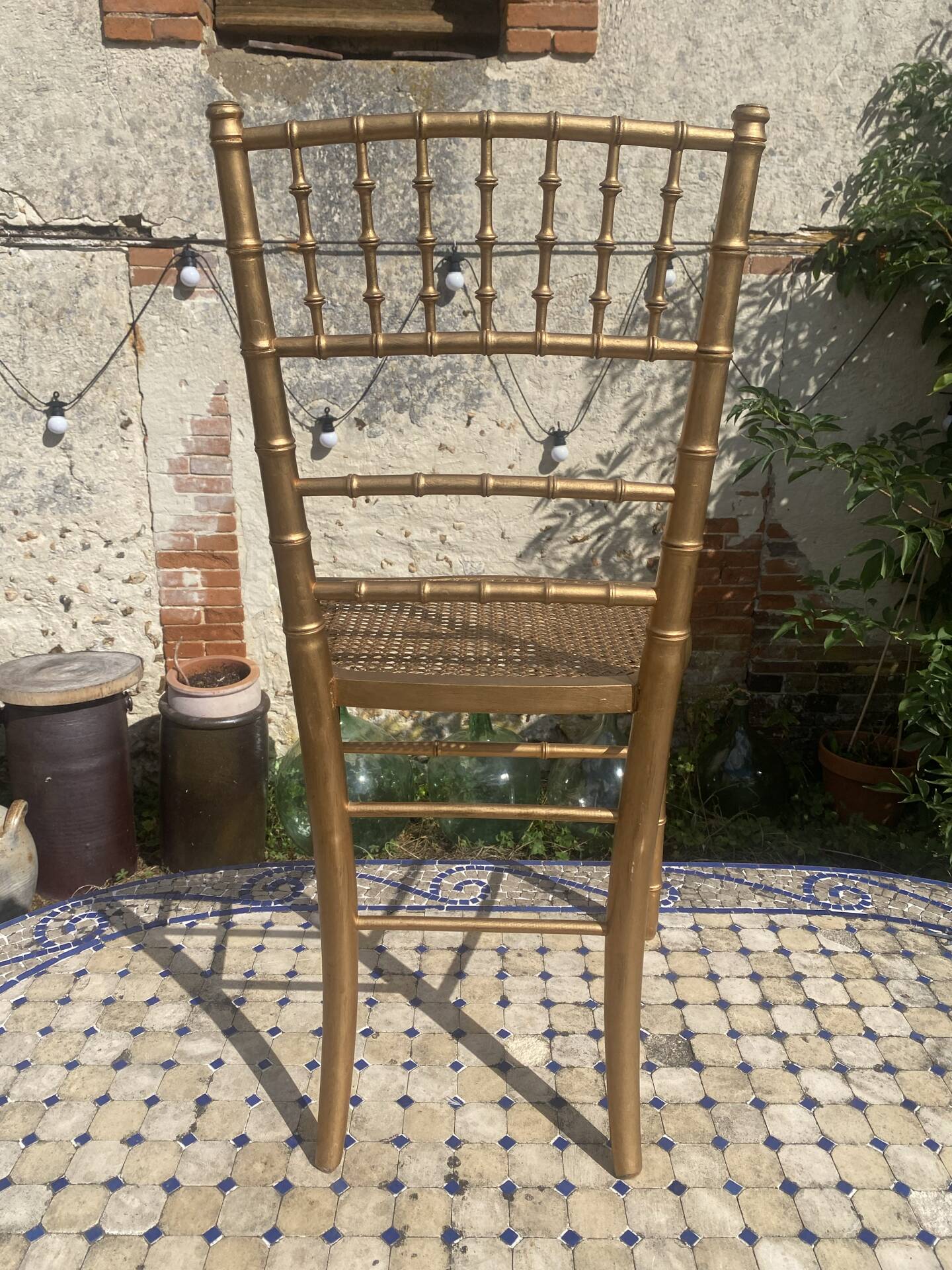 Antique golden bamboo-style chair