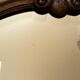 Antique bevelled mirror, oak frame