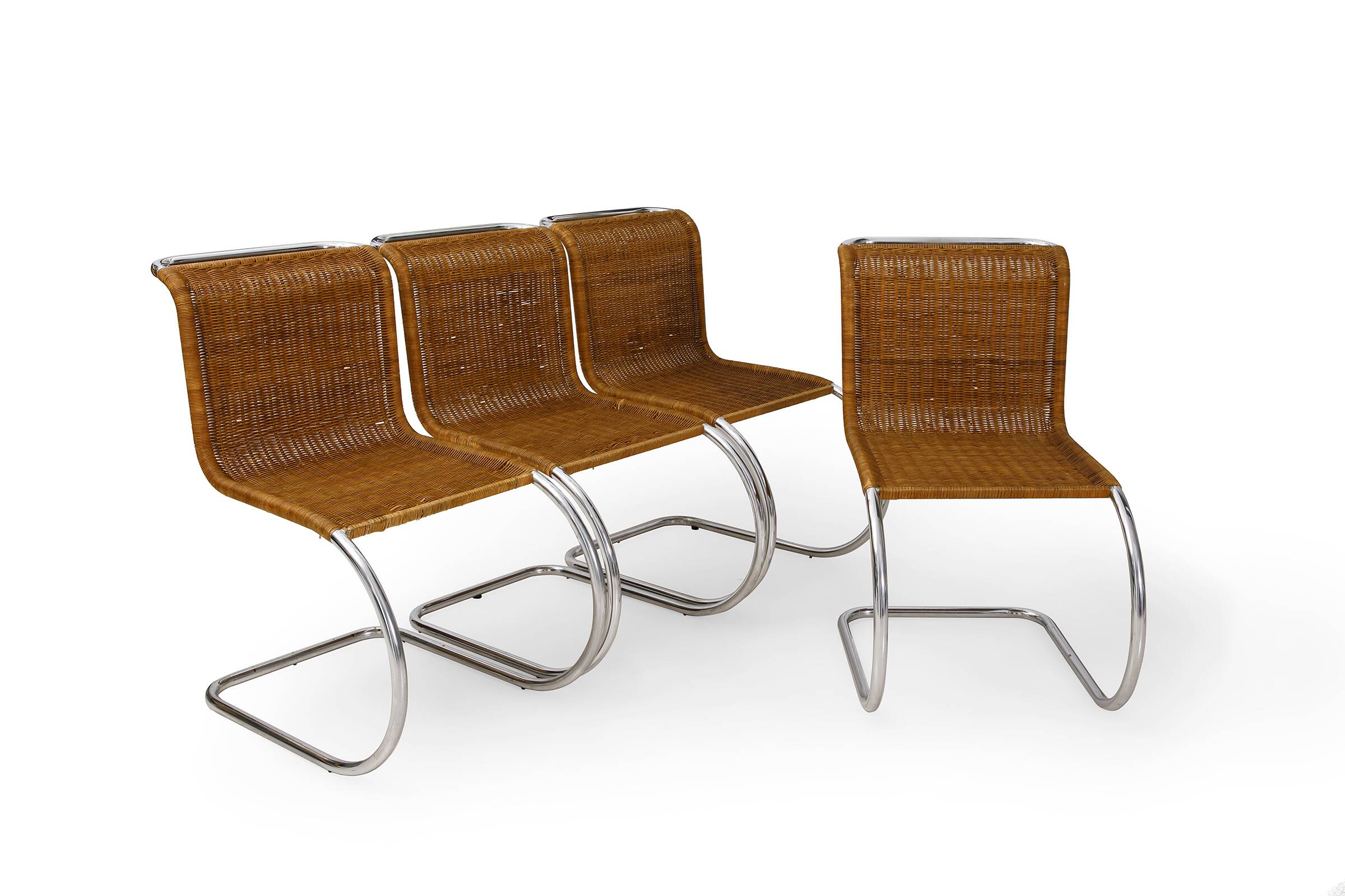 Mr10 chair set in rattan by Ludwig Mies van der Rohe