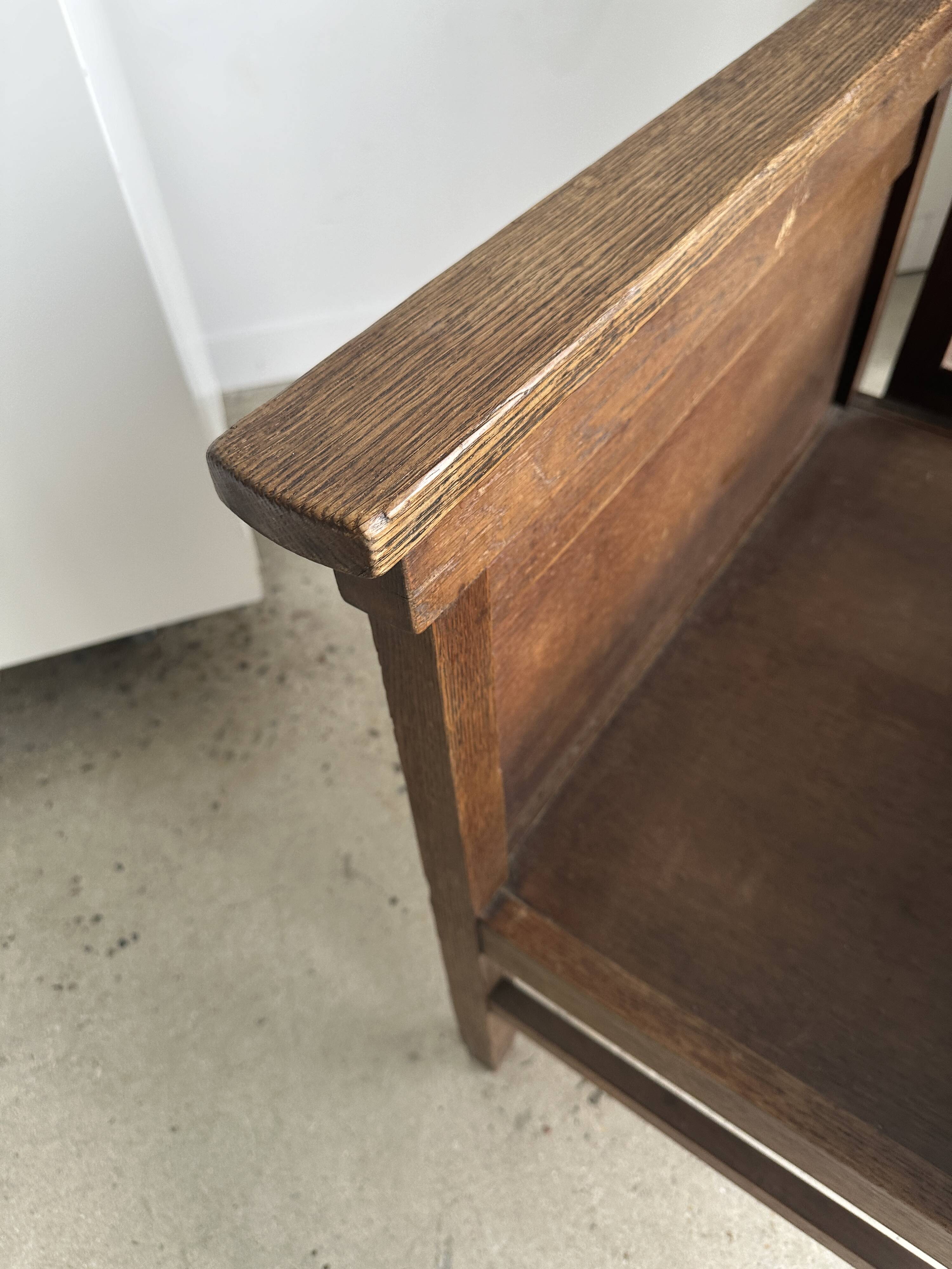 Large wooden armchair with adjustable reclining back