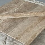Pair of triangular travertine tables