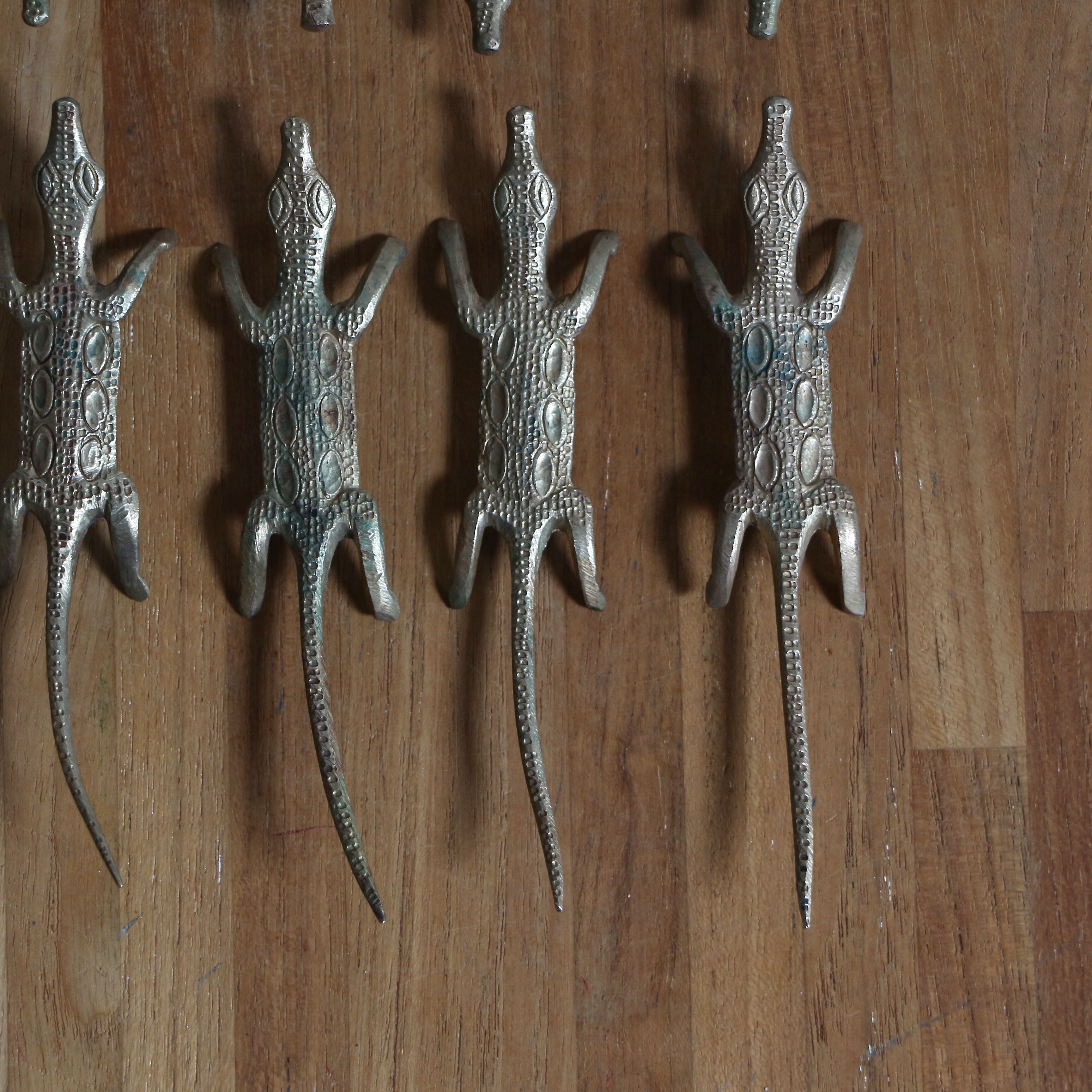 Brass crocodile knife holder