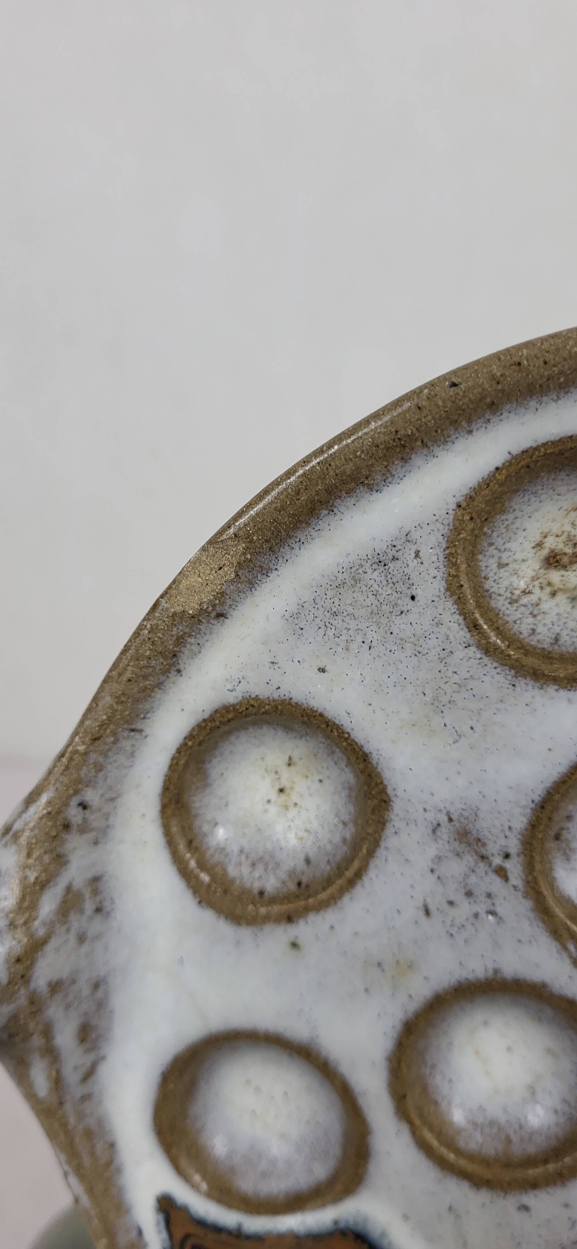 4 stoneware snail plates