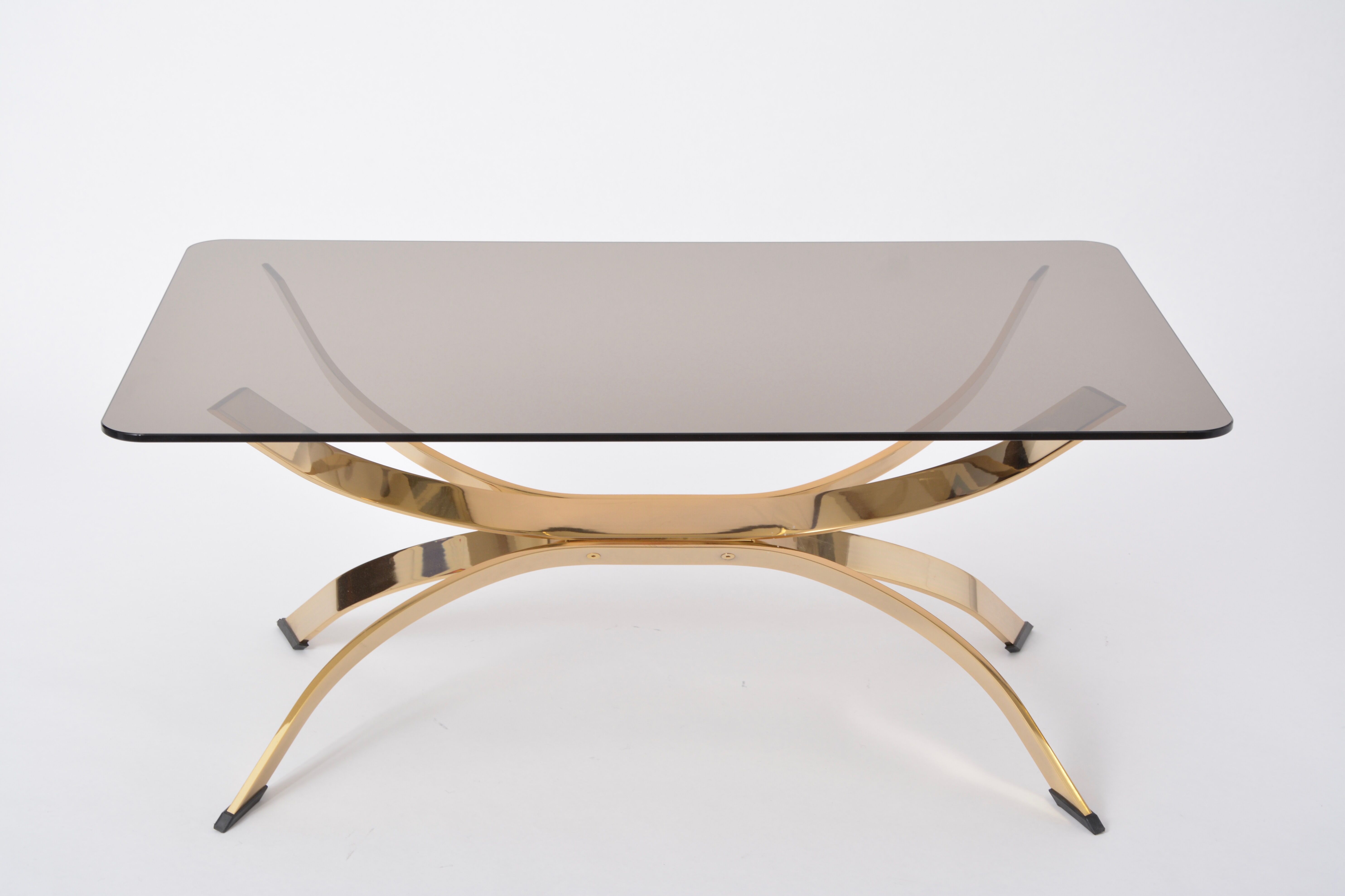 Gold Colored Mid-Century Modern coffee table with smoked Glass top