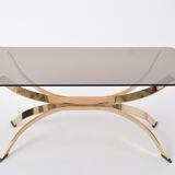 Gold Colored Mid-Century Modern coffee table with smoked Glass top