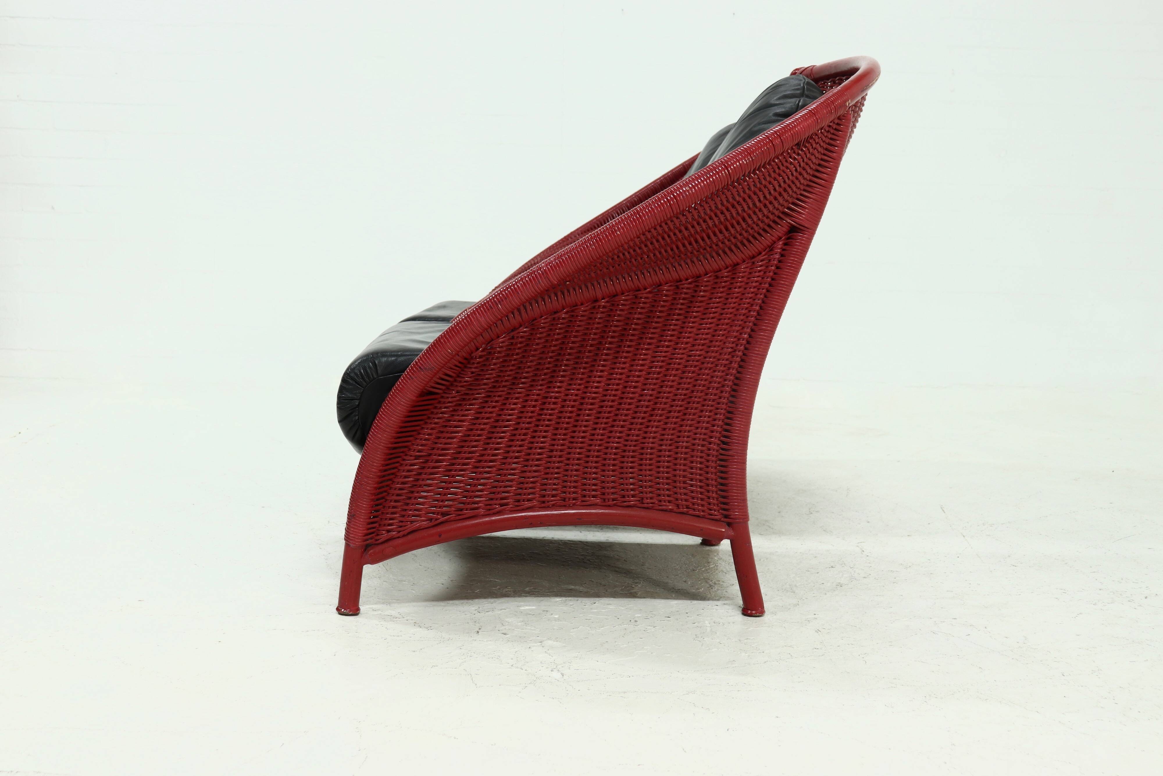 Set of 2 Sculptural Lounge Chairs in Red Lacquered Rattan 1970s