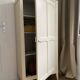 Vintage Parisian wardrobe painted in linen white, one door, three shelves