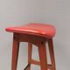 Bar stool, made of teak wood and cognac/red leather. Denmark 1960s